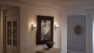 A hallway with two UHP3740 French Country Bath Vanity Lights, a luxurious lighting fixture, from the Missoula Collection by Urban Ambiance.