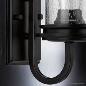An UHP3741 French Country Bath Vanity Light with a clear glass shade by Urban Ambiance.