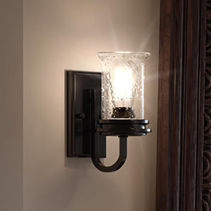 An UHP3741 French Country Bath Vanity Light, 9.5"H x 4.75"W, Midnight Black Finish, Missoula Collection by Urban Ambiance with a glass shade -