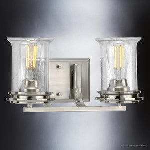 A beautiful UHP3750 French Country Bath Vanity Light from the Missoula Collection by Urban Ambiance, with two glass shades.