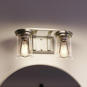 A luxury French Country Bath Vanity Light UHP3750 with two beautiful glass bulbs.