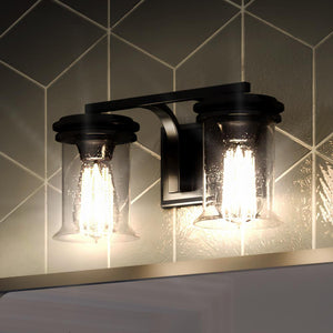 A bathroom with a gorgeous UHP3751 French Country Bath Vanity Lighting fixture.
