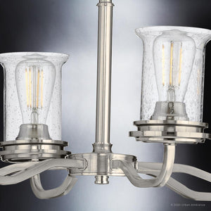 A unique lighting fixture, the UHP3790 French Country Chandelier boasts a gorgeous Brushed Nickel Finish and belongs to the Missoula Collection with clear glass bulbs.