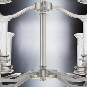 A gorgeous French Country chandelier with frosted glass shades.