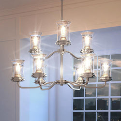 A gorgeous UHP3800 French Country Chandelier lighting fixture in a room with a large window.