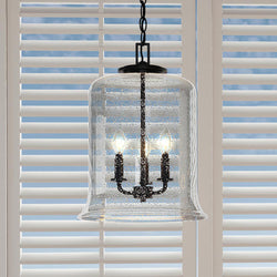 A unique luxury lighting fixture, the Urban Ambiance UHP3821 French Country Pendant Light from the Missoula Collection adds an elegant touch with its Midnight Black Finish while hanging over a window with blinds