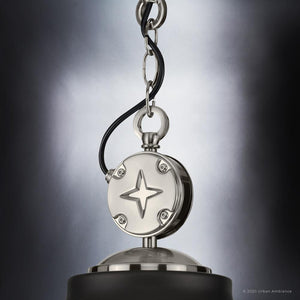 A gorgeous pendant lamp from the Kenner Collection with a star on it.