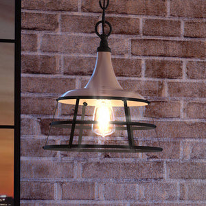 A beautiful lighting fixture, the UHP3850 Urban Loft Pendant Light from the Frederick Collection, hangs in an aged pewter finish from a brick wall.