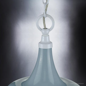 Luxury pendant lighting fixture hanging from a chain.