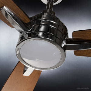 Close-up of the Urban Ambiance UHP9043 Mid Century Modern Indoor Ceiling Fan from the Tybee Collection, featuring three wooden blades and a built-in circular light fixture in polished chrome, viewed from below against a dark background.