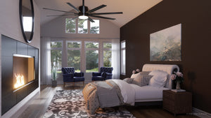 A beautiful bedroom with a unique fireplace and an UHP9050 Urban Loft Indoor / Outdoor Ceiling Fan, 16.8