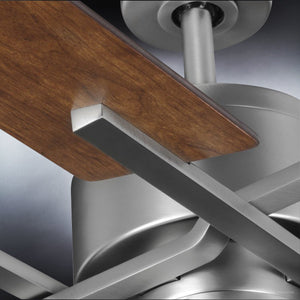 Close-up view of the Urban Ambiance UHP9061 Urban Loft Indoor Ceiling Fan from the Amelia Collection, featuring aged nickel brushed metal components and a reversible wooden blade, shown against a subtle gradient background; measures 15.4″H x 56″W.