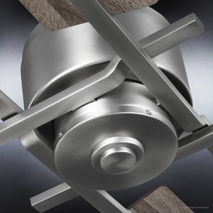 Close-up of the Urban Ambiance UHP9061 Urban Loft Indoor Ceiling Fan from the Amelia Collection, featuring a 56-inch width and aged nickel finish with reversible wooden blades, highlighting the central motor housing and connecting hardware against a dark background.