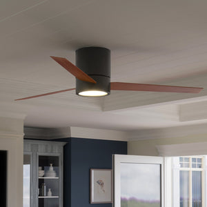 A beautiful UHP9072 Modern Indoor Ceiling Fan in a living room with blue walls made by Urban Ambiance.