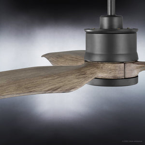A close-up of the Urban Ambiance UHP9090 Modern Indoor Ceiling Fan from the Lewes Collection, showcasing its solid wood blades and matte black (charcoal) motor housing, set against a dark gradient background.