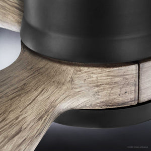Close-up of the UHP9090 Modern Indoor Ceiling Fan from the Lewes Collection by Urban Ambiance in charcoal, showcasing its sleek black metal construction paired with a wooden accent that highlights the intricate wood grain texture and smooth metal surface—an elegant representation of the craftsmanship behind its solid wood blades.
