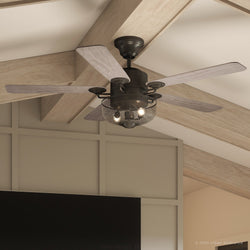 An Urban Ambiance UHP9100 Vintage Indoor Ceiling Fan, 20"H x 54"W, Olde Iron, Southport Collection in a living room with wood beams.