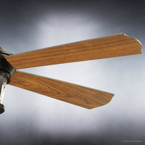 Close-up of two wooden blades of the Urban Ambiance UHP9180 Modern Farmhouse Indoor or Outdoor Ceiling Fan from the Catalina Collection, featuring an Olde Bronze metal fixture, set against a gradient gray background.