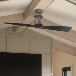 A living room with a beautiful Urban Ambiance UHP9200 Cosmopolitan Indoor Ceiling Fan, 18.1"H x 56"W, Polished Chrome, Jamestown Collection and TV.