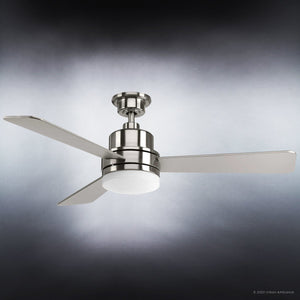 The Urban Ambiance UHP9210 Modern Indoor Ceiling Fan from the Capitola Collection features three sleek metal blades and a central light fixture, all mounted on a brushed nickel rod, showcased against a gradient backdrop.