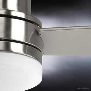 Close-up of the Urban Ambiance UHP9210 Modern Indoor Ceiling Fan from the Capitola Collection, featuring a brushed nickel finish and frosted light cover, set against a dark background.
