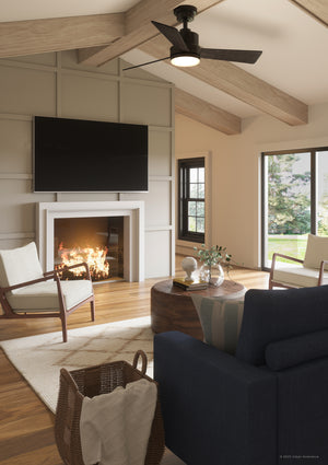 A gorgeous living room with a UHP9220 Modern Indoor Ceiling Fan and fireplace.