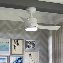 An UHP9222 Modern Indoor Ceiling Fan, 15.6"H x 44"W, Matte White, Capitola Collection by Urban Ambiance in a room with pictures on the wall and