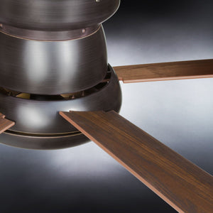 Close-up of the Urban Ambiance UHP9230 Traditional Indoor Ceiling Fan from the Beaufort Collection, featuring three American Walnut blades and a dark Olde Bronze central fixture, set against a gradient background.