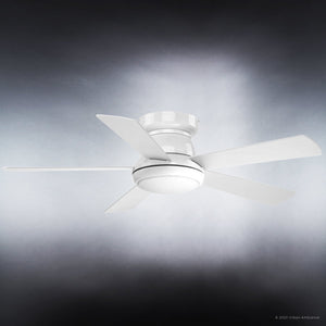 A sleek white ceiling fan from Urban Ambiance’s Beaufort Collection, the UHP9232 Traditional Indoor Ceiling Fan (11.6″H x 52″W), is set against a gradient gray background. It features four blades, an opal glass diffuser, and an integrated LED light for sophisticated style and energy efficiency.