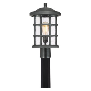 The Urban Ambiance UQL1046 Craftsman Outdoor Post Light from the Vienna Collection features a natural black finish, clear glass shade, metal grid design, and marine-grade weather-resistant construction. Measures 17.25