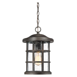 Elevate your entryway or patio with the Urban Ambiance UQL1049 Craftsman Outdoor Pendant Light from the Vienna Collection. Featuring a durable marine-grade metal frame in a Parisian Bronze finish, clear glass panels, and a visible vintage-style bulb suspended by a chain, this elegant 15.5″H x 10″W fixture seamlessly blends timeless traditional charm with superior outdoor durability.