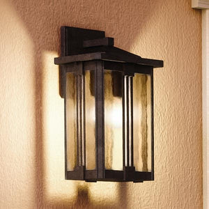 A unique UQL1051 Craftsman Outdoor Wall Light from the London Collection by Urban Ambiance on a wall.