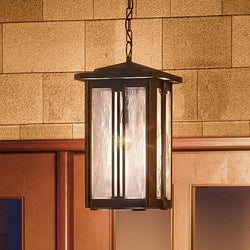 A unique and luxurious Craftsman outdoor pendant lamp, 19"H x 10.5"W, with a Natural Black Finish, from the London Collection designed by Urban Ambiance.