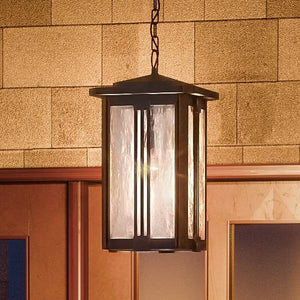 A unique and luxurious Craftsman outdoor pendant lamp, 19"H x 10.5"W, with a Natural Black Finish, from the London Collection designed by Urban Ambiance.