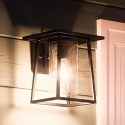 A unique and beautiful UQL1091 Craftsman Outdoor Wall Light, 10.5"H x 8"W, Black Silk Finish, Lisbon Collection by Urban Ambiance on the side of