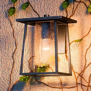 A unique and luxurious outdoor wall lamp from the Lisbon Collection, featuring ivy and a Black Silk Finish.