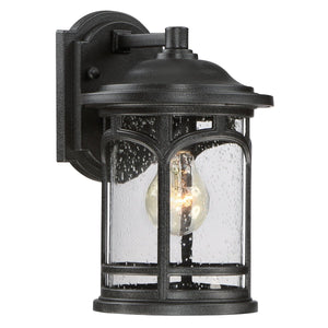 The UQL1100 Rustic Outdoor Wall Light by Urban Ambiance features a black silk finish, clear glass panels, and visible bulb on a rectangular backplate—modern style meets rustic charm in this marine-grade 11