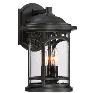The Urban Ambiance UQL1102 Rustic Outdoor Wall Light from the Sydney Collection features a black silk finish, marine-grade construction, and clear seeded glass shade over two candle-style bulbs (14.5