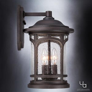 The Urban Ambiance UQL1103 Rustic Outdoor Wall Light from the Sydney Collection features a durable marine-grade construction with a Parisian Bronze finish, black metal frame, and clear seeded glass. This 14.5″ high by 9″ wide wall sconce includes two candle-style light bulbs and is perfect for creating an elegant look against any neutral background.