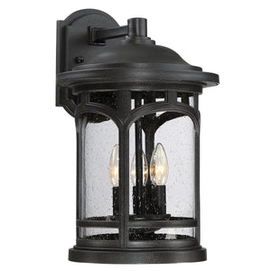 The Urban Ambiance UQL1104 Rustic Outdoor Wall Light from the Sydney Collection features a black silk finish, marine-grade construction, and clear glass panels with three candle-style bulbs—perfect as a durable wall sconce for any entryway.
