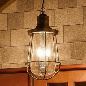 A gorgeous Vintage Outdoor Pendant Light, 20"H x 9.5"W, hanging over a doorway from the San Francisco Collection.