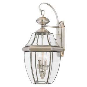 A unique UQL1145 Colonial Outdoor Wall Light with clear glass and an Aged Silver Finish, part of the Cambridge Collection by Urban Ambiance.