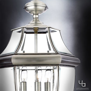 An Urban Ambiance luxury outdoor lighting fixture with three unique UQL1151 Colonial Outdoor Post Lights.
