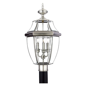 A gorgeous lamp with a metal frame and a glass shade.