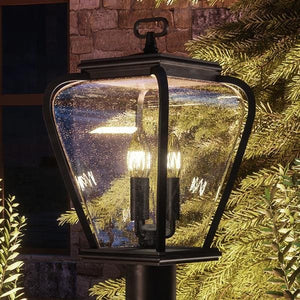 An UQL1203 French Country Outdoor Post Light by Urban Ambiance, 18"H x 9.5"W, with a unique clear glass shade.