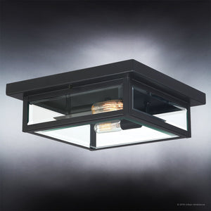 A unique outdoor lighting fixture, the UQL1335 Farmhouse Outdoor Ceiling Light boasts a luxury black finish and features a glass shade.