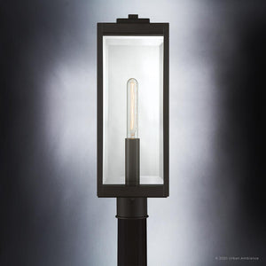 The Urban Ambiance UQL1353 Modern Farmhouse Outdoor Post/Pier Light from the Quincy Collection features a rectangular beveled glass enclosure that highlights a single exposed bulb, finished in Estate Bronze (20.5″H x 7″W). Set against a gradient gray background, it’s an ideal choice for those seeking stylish modern farmhouse outdoor lighting.