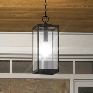 An Urban Ambiance UQL1354 Modern Farmhouse Outdoor Pendant Light with a beautiful glass shade.