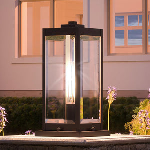 A gorgeous Urban Ambiance UQL1355 Modern Farmhouse Outdoor Pier Light for a luxury outdoor space.