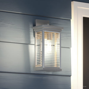 A stunning UQL1392 Modern Outdoor Wall Light, 14.5"H x 7"W, Stainless Steel Finish from the Duluth Collection by Urban Ambiance, on the side of